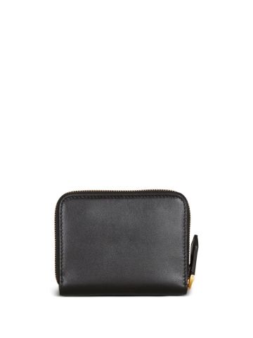Black wallet with gold logo plaque
